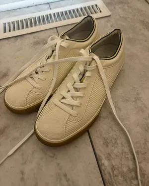 Rothy’s The Lace Up Knit Sneakers in Cream thumbnail 1