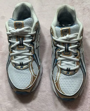 New Balance White Sneakers with Gold and Blue Accents 153 thumbnail 1