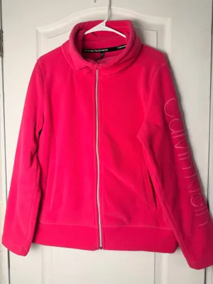 Calvin Klein fleece teddy jacket in vibrant hot pink. Full-zip front with stand collar. Side pockets for hands. Subtle branded detail on the sleeve. Soft, cozy finish for everyday wear. thumbnail 3