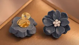 Paparazzi Blue flower ear clips thumbnail 1
