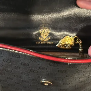 Gucci vintage crossbody bag black with red trim. Beautiful inside has wear shown thumbnail 4
