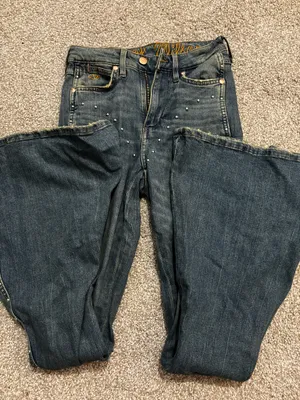 Lainey wilson wrangler jeans thumbnail 1