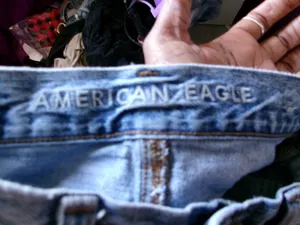 American Eagle Outfitters mom jean ripped distressed denim in light wash blue size 2. thumbnail 9