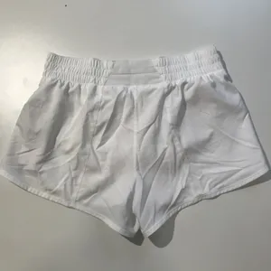 Women's Nike One Dri-FIT Mid-Rise Brief Lined Graphic Shorts thumbnail 2