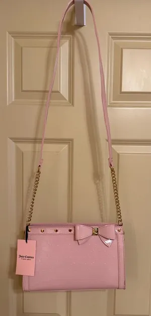 Juicy Couture Light Pink Bow Crossbody with Gold Chain thumbnail 1
