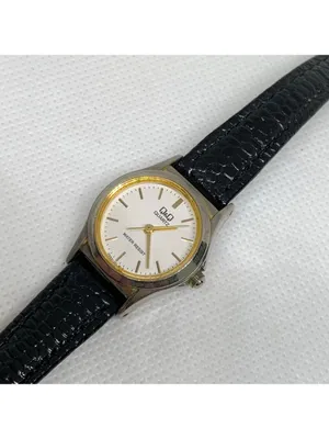 Vintage Q&Q women’s watch 22mm gold tone black leather band up to 7” running thumbnail 2