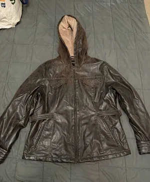 Brown leather jacket with hood and pockets. Size: L #leatherjacket #outerwear thumbnail 1