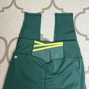 💚 Fabletics Motion 365 Boost PowerHold High-Waisted 7/8 Leggings thumbnail 1