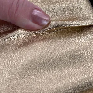 Shimmering Vintage faux leather gold clutch. thumbnail 11