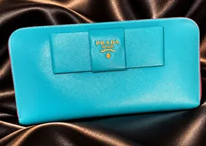PRADA REWORK: Turquoise Saffiano Leather Bow Clutch with Gold Logo thumbnail 1