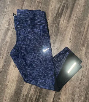 Nike Dri-FIT Blue Athletic Leggings thumbnail 1