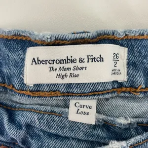 Curve Love Abercrombie & Fitch Crossover Waist High Rise Mom Shorts thumbnail 10