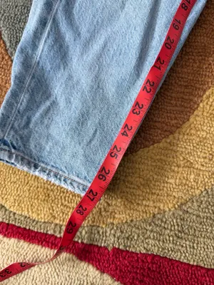 American Eagle Relaxed Mom Jeans High Rise Light Wash Distressed Deep Cut Size 0 thumbnail 2
