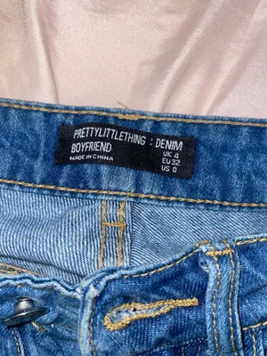 PrettyLittleThing blue denim jeans Size UK 4 thumbnail 2