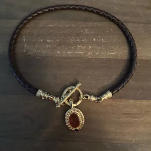 Brown leather braid toggle necklace with carved Roman head pendant thumbnail 2