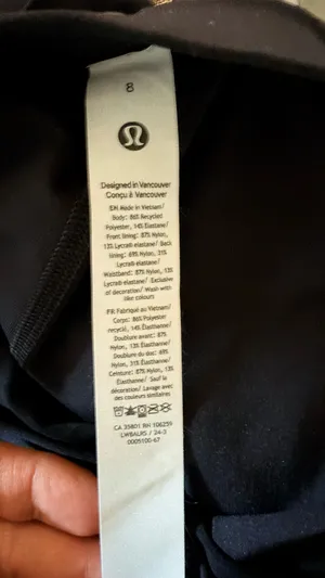 Lululemon The lighting isn’t the best but this is a black skirt with no fading and tag intact with no wrinkle thumbnail 4