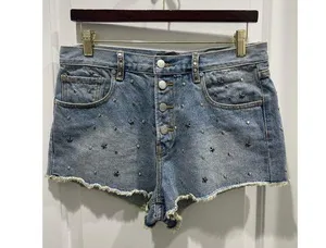 NWOT MINKPINK Studded Button Fly Denim Cut Off Shorts M thumbnail 1