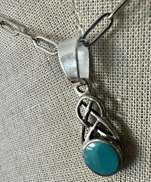 Sterling Silver Celtic Knot Pendant Necklace with Turquoise-Colored Stone thumbnail 1