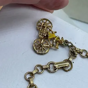Vintage 6” charm bracelet. Gold tone with crossover clasp. thumbnail 4