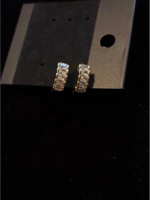 Gold tone CZ Huggie Hoops | Baguette + Round Crystals thumbnail 6