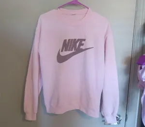 NIKE pullover sweatshirt sweater in pink. Tags have been removed but this fits like a small. thumbnail 1