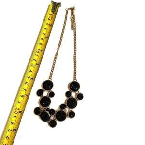 Black and gold tone statement necklace thumbnail 4