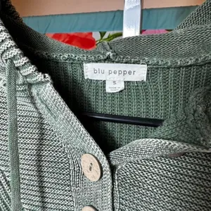 P68. Blu Pepper green knit hoodie with button detail thumbnail 2