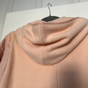Essentials Golden Logo Sherpa Fleece Hoodie Blush Gold NWT thumbnail 6