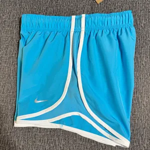 Nike Women’s Tempo Dri-Fit Mid-Rise 3-Inch Running Shorts thumbnail 5