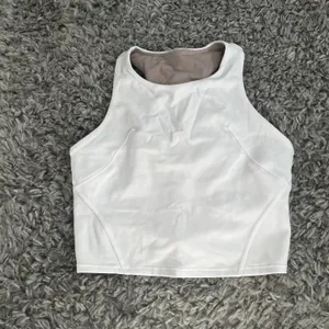Lululemon White Invigorate Tank Size 6 thumbnail 1