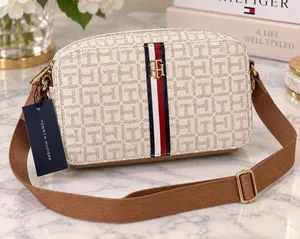 Tommy Hilfiger White Monogram Crossbody with Tricolor Stripe thumbnail 1