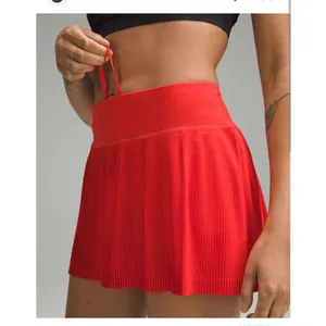 Lululemon Pleat‎ to Street Mid-Rise Red Skort Size: 0 thumbnail 2