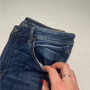 American Eagle Outfitters Super Hi-Rise Dark Wash Jegging (14) thumbnail 3