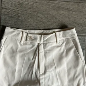 Cream trousers thumbnail 3