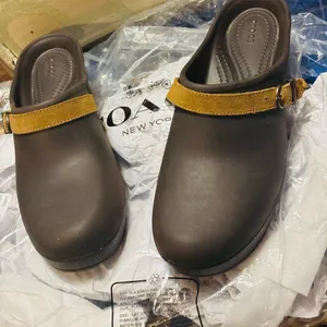 Crocs Sarah clogs in a brown color with a tan suede leather strap thumbnail 7