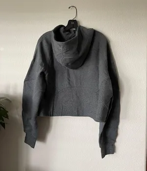 Lululemon scuba oversized half zipper hood sweater NWT. Color in heathered speckled black in original package. Size M/L item coming with one free shopping bag thumbnail 7