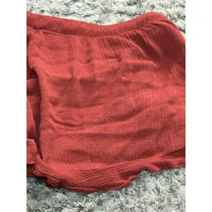Forever 21 Shorts Women’s Ruffle Tiered Smocked Waist Hot Pants rust brown Approx Size S thumbnail 8