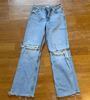 Zara Light Blue Distressed Flare Jeans thumbnail 1
