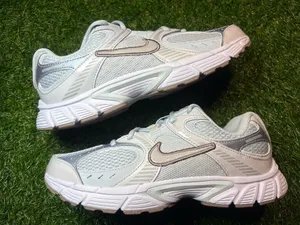 Nike running sneakers. 6 youth, women’s 7.5. Neutral colors. So pretty. thumbnail 1