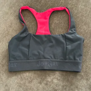 Jo + Jax sports bra. Elastic bottom with logo. Color- gray/hot pink. Size-XSA thumbnail 1