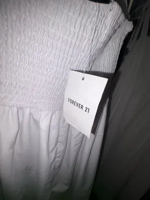 Forever 21 white halter/ tube maxi dress featuring a smocked back It is constructed with making it a staple piece for summer or vacation wear. thumbnail 4