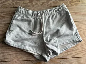 Athleta Grey Sweat Shorts m spot on the back in pic thumbnail 1