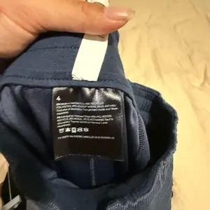 Lululemon Ribbed Softstreme Mid-Rise Wide-Leg Cropped Pant 25" True Navy thumbnail 9