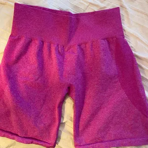 NVGTN Women's Athletic Shorts in Magenta Pink thumbnail 1