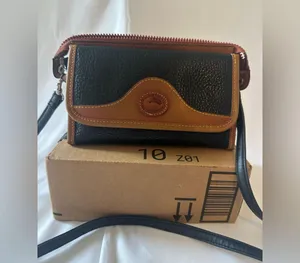 Vintage Dooney & Bourke Black & Brown Fold Over Leather Crossbody Shoulder Bag thumbnail 1