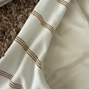 Revolve PQ swim bikini set white with gold stripes thumbnail 4
