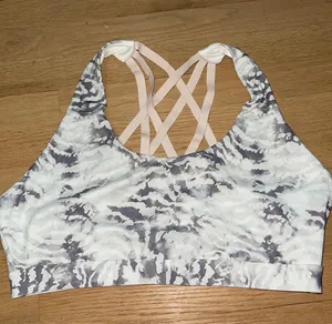 Fabletics grey patterned sports bra thumbnail 1