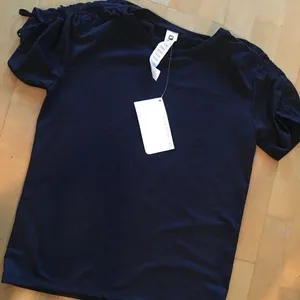 Fabletics Waffle Knit, Lightweight, Ruched Sleeve Tee, Black, Size XS thumbnail 1