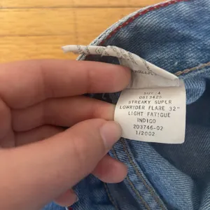 Vintage Y2K Super Low Rise Flare Tommy Hilfiger Jeans with slit thumbnail 9