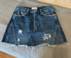 Free People Button Fly Distressed Shredded Fringe Hem Cutoff Jean Skirt thumbnail 1